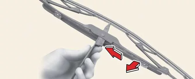 Kia EV6 releasing windshield wiper blade from wiper arm