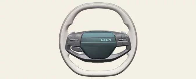 Kia EV6 steering wheel horn activation area and driver controls