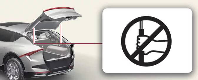 Kia EV6 power liftgate support strut and safety warning illustration