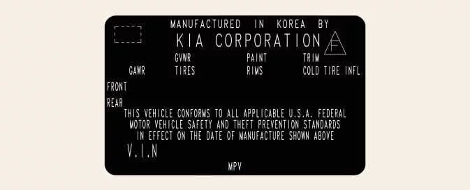 Kia EV6 certification label showing GVWR and GAWR information on driver side door sill