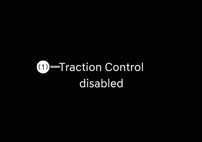 Dashboard indicator showing Traction Control disabled in the Kia K4
