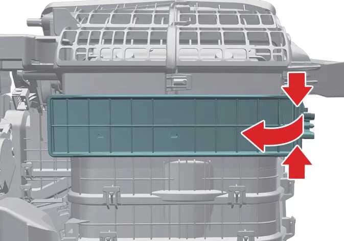 Releasing the climate control air filter cover in the Kia K4