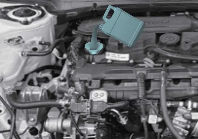 Close-up view of the dipstick markings for the Kia K4 G1.6 T-GDi turbo engine
