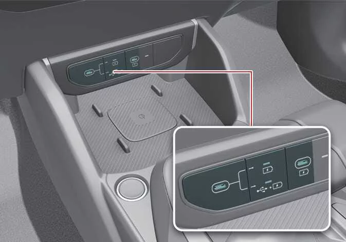 Front instrument panel USB charging port in the Kia K4
