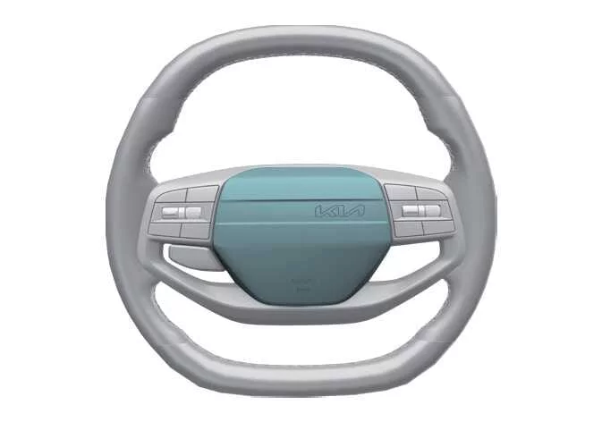 Location of the horn activation area on the Kia K4 steering wheel