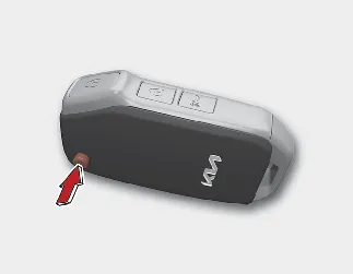 Kia Seltos folding key release button and unfolded key blade
