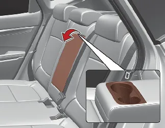 Kia Seltos rear seat armrest folded down from the seatback
