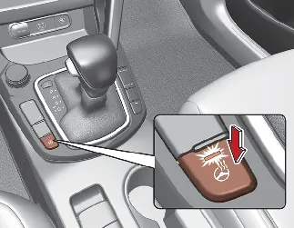 Kia Seltos heated steering wheel button on dashboard
